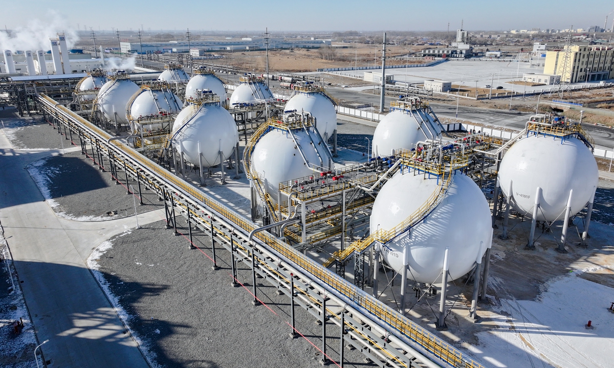Aerial view of spherical ammonia storage tanks connected by elevated pipe racks